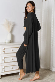 Black loungewear set with long cardigan, crop top, and drawstring pants.