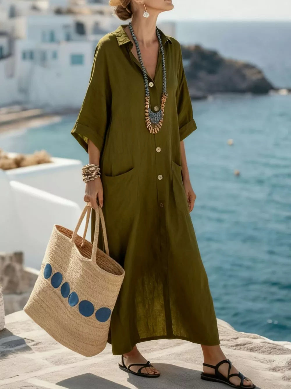 Olive green button-front maxi dress with 3/4 sleeves and pockets
