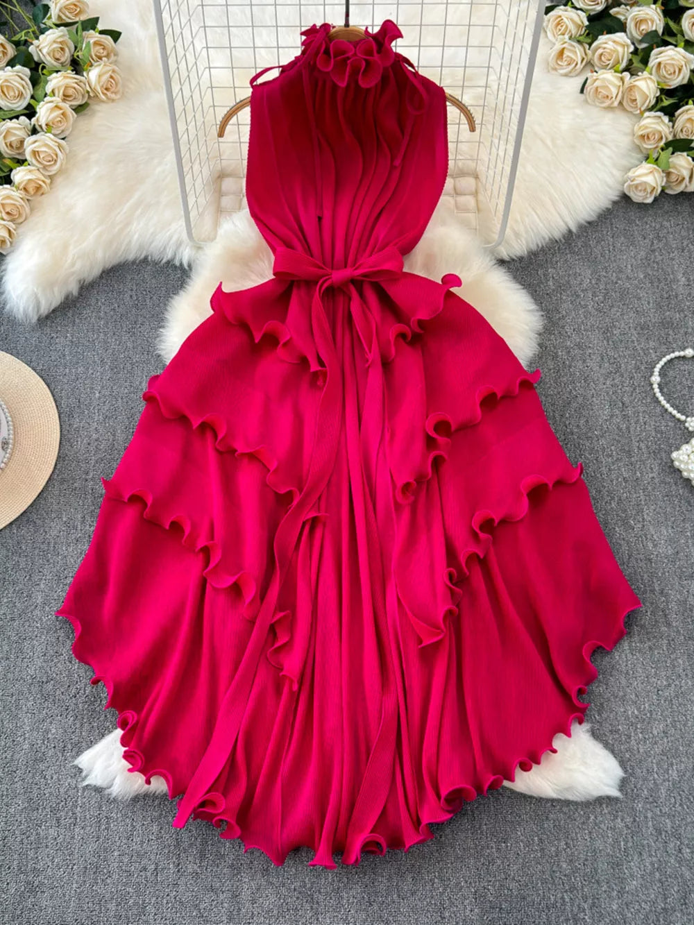 Rose Red ruffled tiered midi dress with belted waist and frill details.