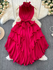 Rose Red ruffled tiered midi dress with belted waist and frill details.