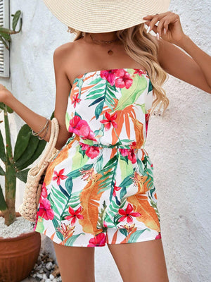 Strapless romper with colorful tropical floral print, elasticized waist, and short legs.