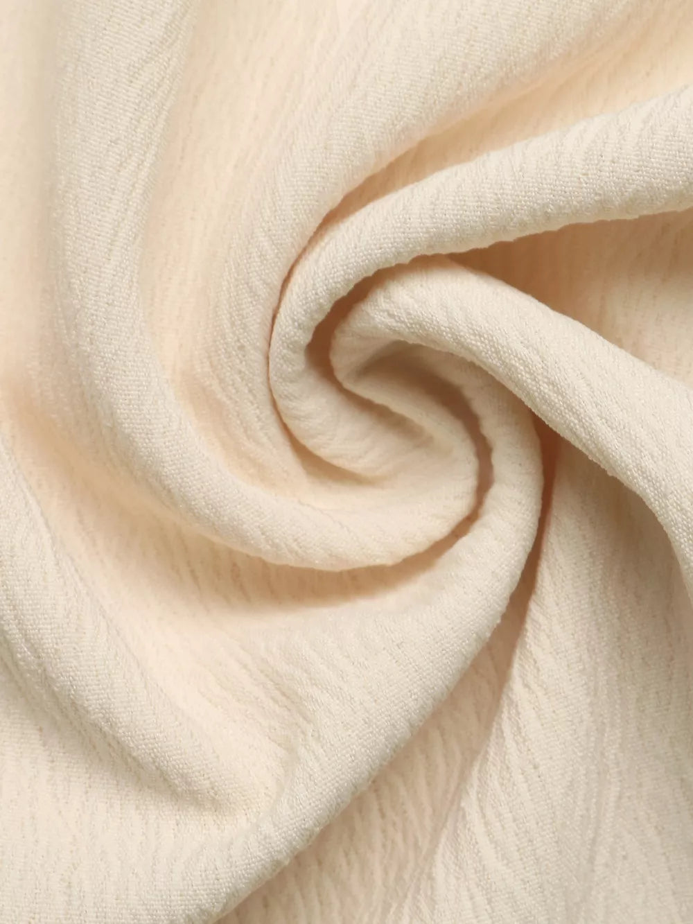 Cream pleated V-neck strapless romper fabric detail