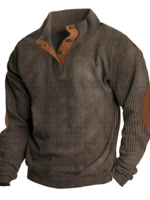 Brown corduroy long sleeve overshirt with button detail and suede elbow patches.