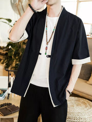 Navy contrast trim half sleeve shirt with white cuffs, open front, cotton blend.