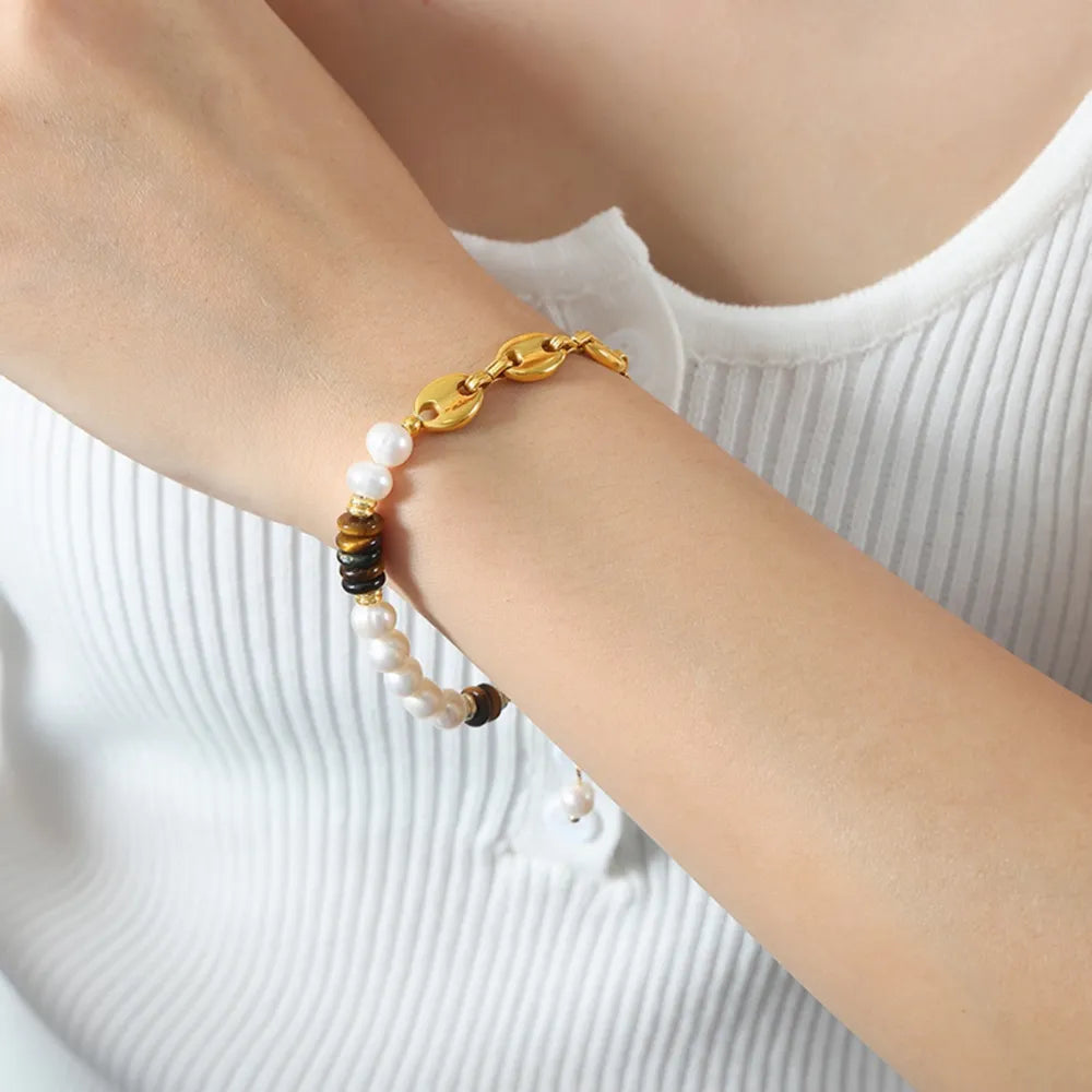 Gold link bracelet with pearls and tiger's eye beads