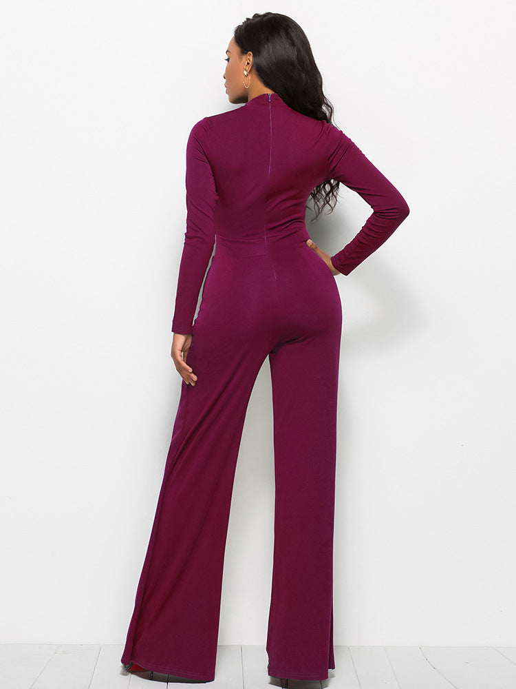 Wine high-waisted palazzo jumpsuit with long sleeves and a mock neck.