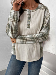 Textured raglan plaid henley top in cream with button detail and long sleeves.