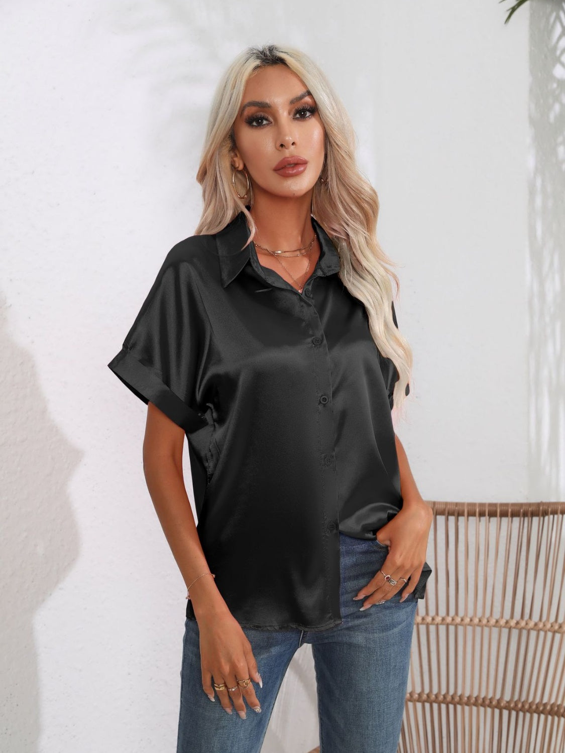 Black satin boxy sleeve button-down blouse with a relaxed fit.