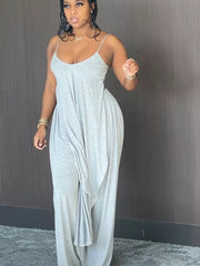 Grey cami and wide-leg pants set with asymmetrical draped hem.