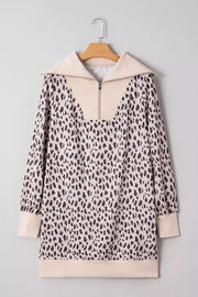 Leopard print cotton mini dress with zip-up collar and long sleeves.