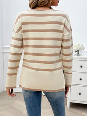 Oversized knit top in tan and cream stripes with V-neck and ribbed hem.