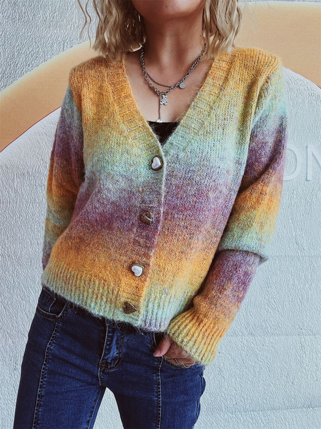 Ombre knit cardigan with heart buttons and V-neck, acrylic blend.
