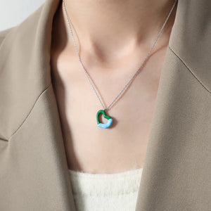 Two-tone heart enamel necklace with silver chain, green and blue enamel.