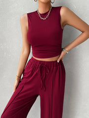 Burgundy ribbed sleeveless crop top and drawstring wide-leg lounge pants set.