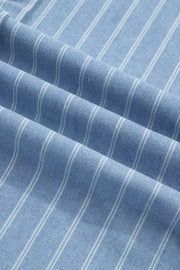 Denim mini dress with vertical white pinstripes and a textured weave.