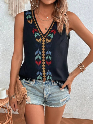 Black embroidered V-neck tank top with colorful geometric detail and tassel trim