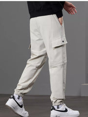 Men S Casual Cargo Pants With Drawstring Waist in Khaki, editorial view