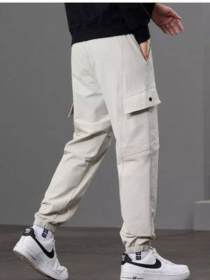 Men S Casual Cargo Pants With Drawstring Waist in Khaki, editorial view