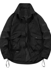 Black oversized urban cargo jacket with multiple pockets and a high collar.
