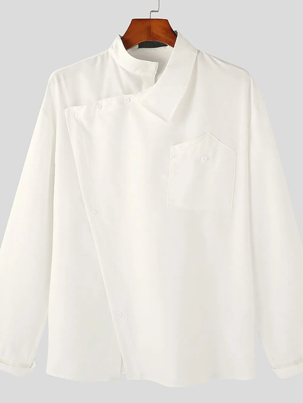 White asymmetric button-up shirt with architectural collar and chest pocket.