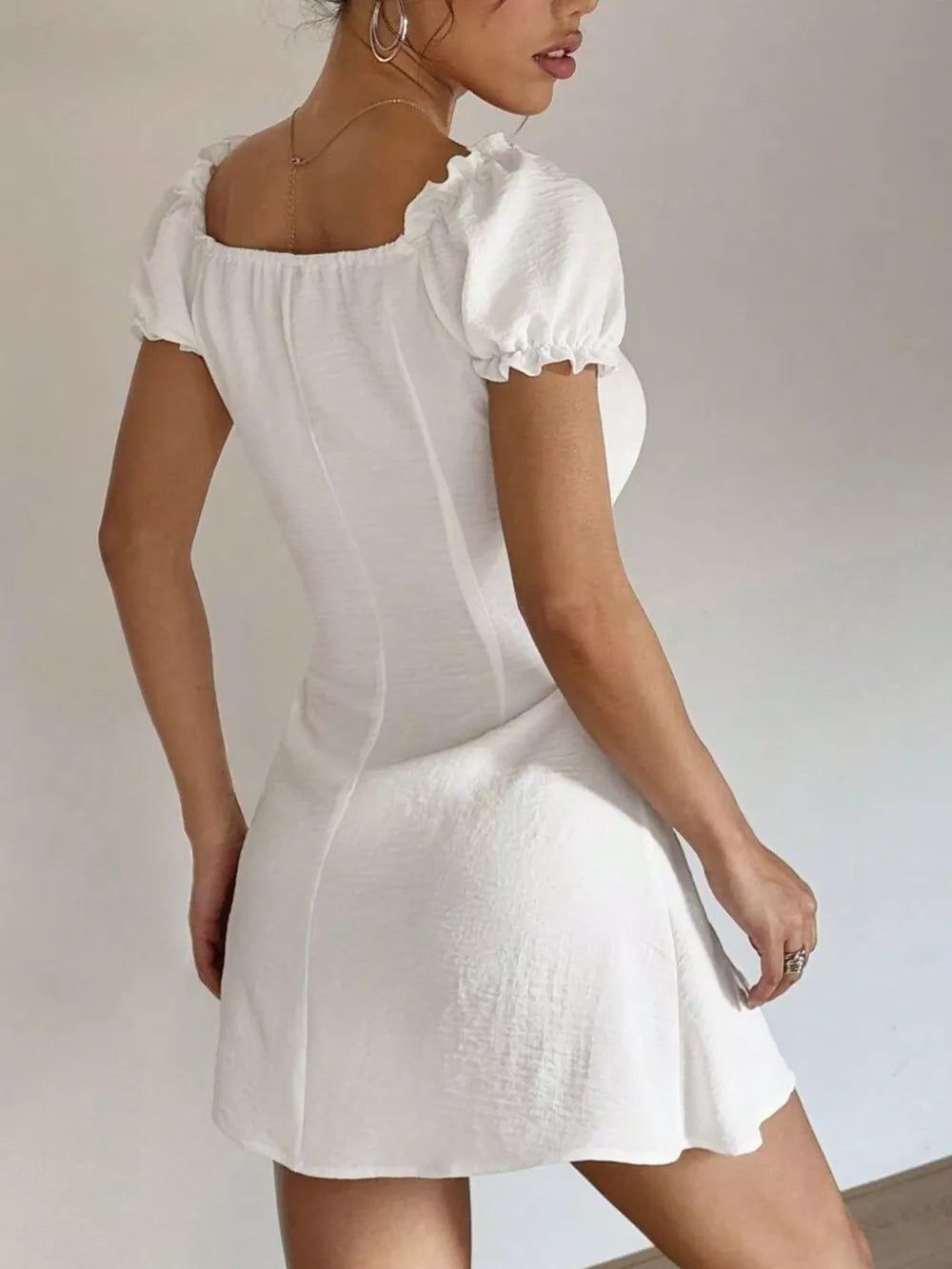 Ruched Button-front Puff Sleeve Mini Dress in White, model styling view