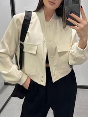Cream utility pocket bomber jacket with buttoned front and ribbed cuffs.