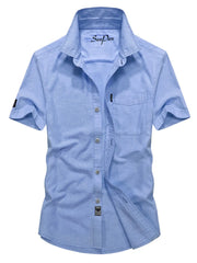 Men's sky blue short sleeve button-down shirt with pocket and classic collar.