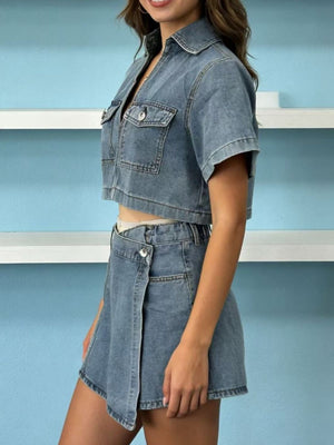 Light wash denim cropped button-down top with dual chest pockets and matching mini skort.