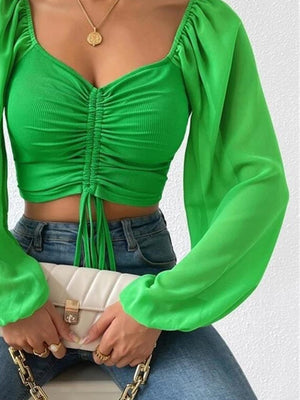 Lime green ruched bodice puff sleeve crop top with drawstring detail