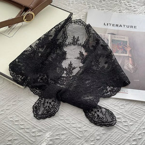 Black delicate floral lace scarf with scalloped edges and intricate embroidery.