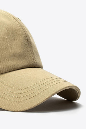 Khaki cotton baseball cap with stitched details on the brim.