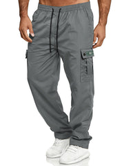 Gray cargo pants with adjustable waist and drawstring, featuring multiple pockets.