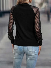 Black ribbed knit sweater with sheer stripe sleeves