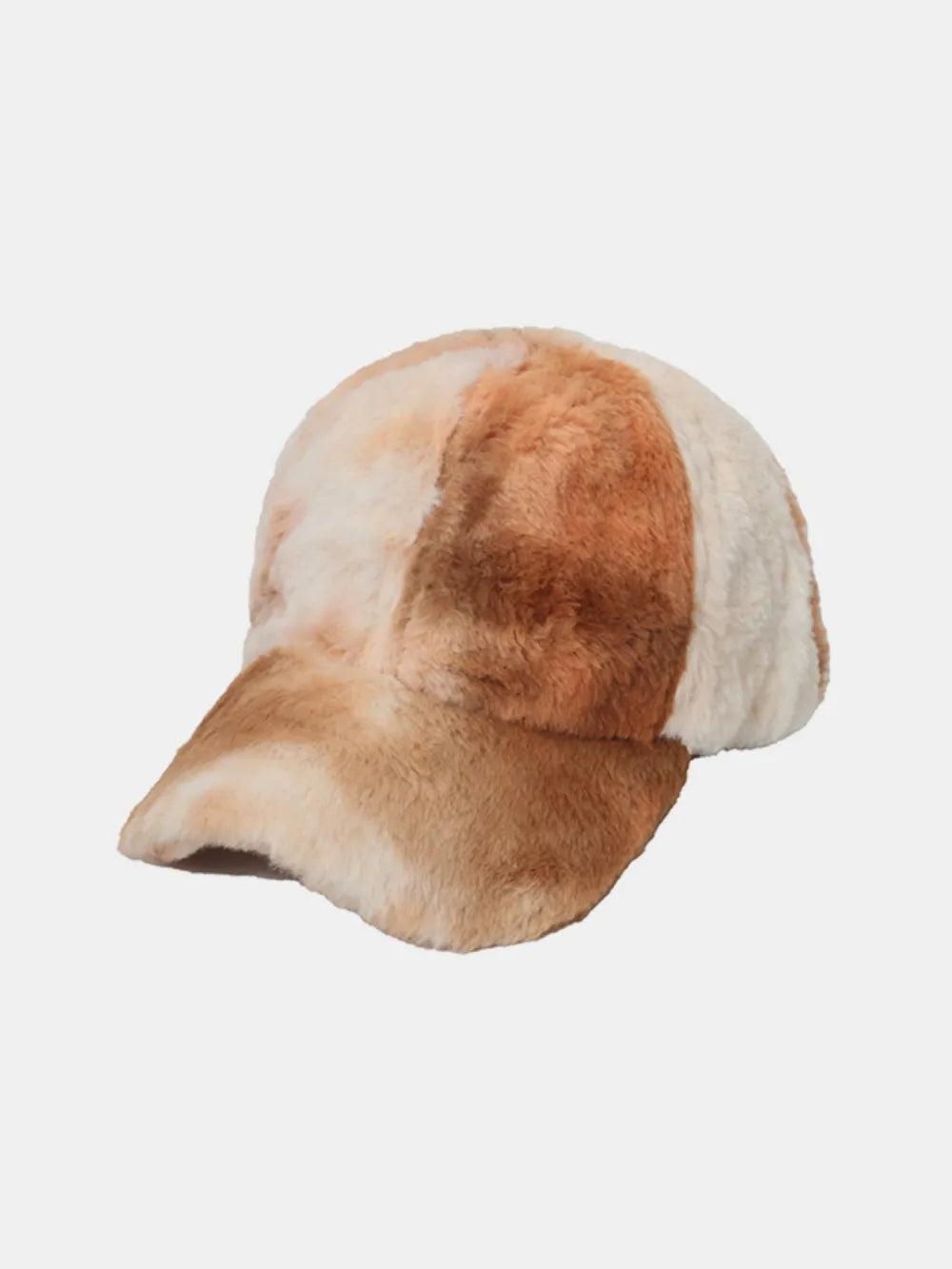 Faux fur baseball cap in caramel and cream with a tie-dye pattern.