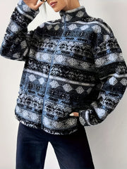 Textured Aztec zip-up fleece jacket in dark blue with a stand-up collar and full zip closure.