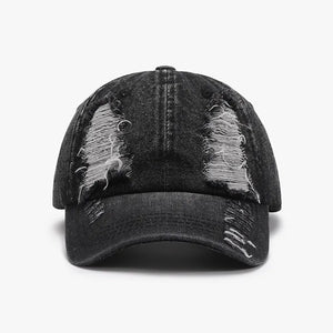Black denim baseball cap with shredded details and distressed accents.