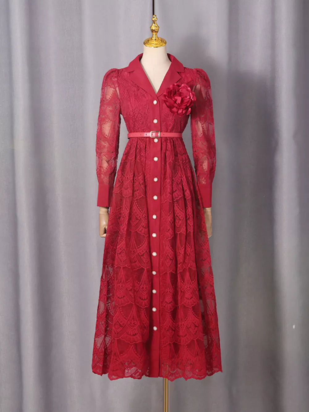 Red lace midi dress with button placket, collared neckline, and flower detail.