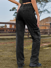 Utility denim straight leg cargo pants in dark gray with multiple pockets.