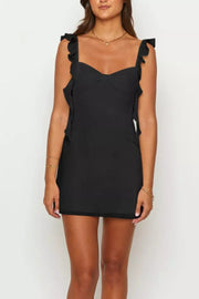 Black sweetheart mini dress with ruffled straps and hem