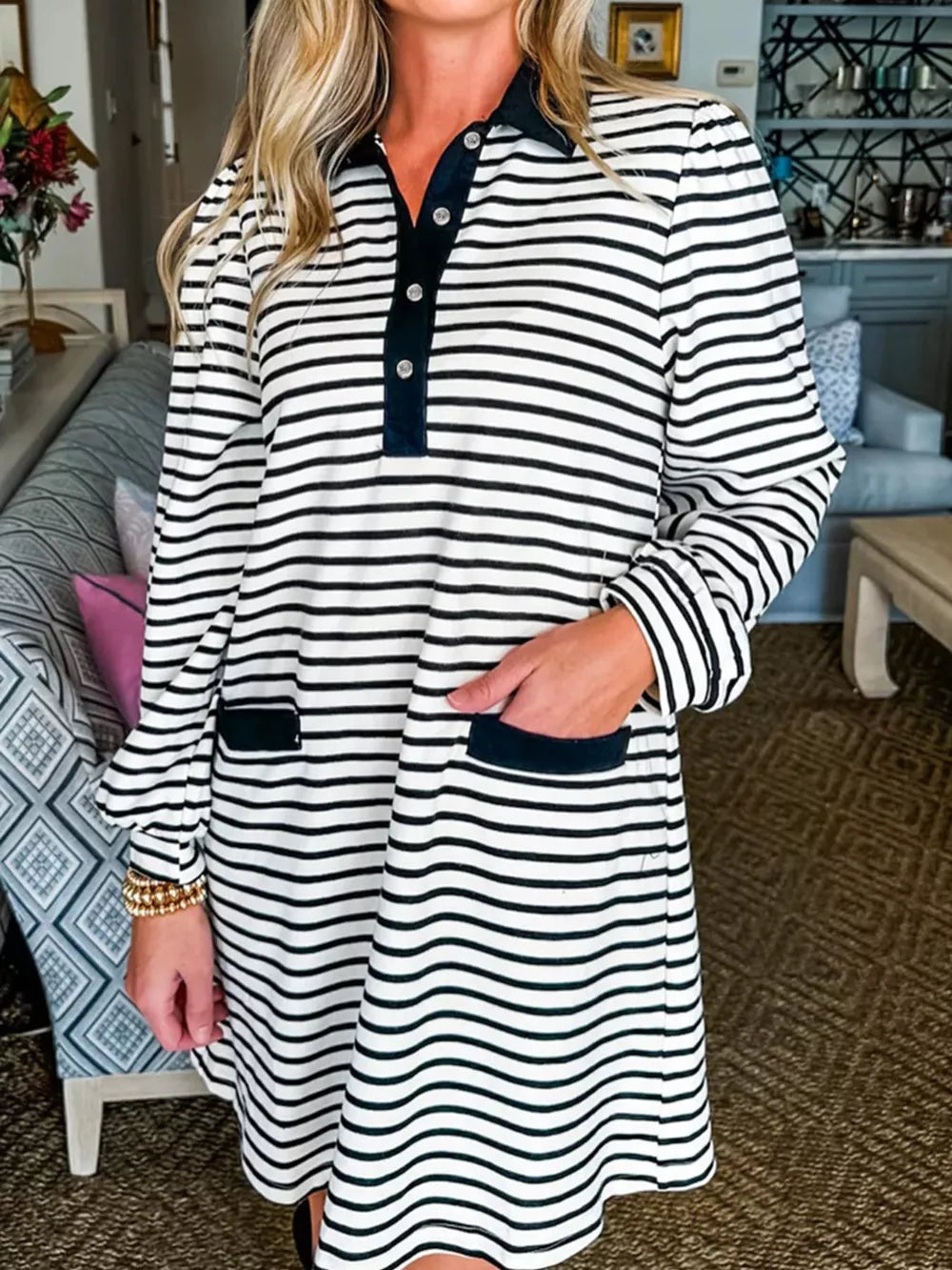 Striped collared long sleeve dress with pockets and button detail.