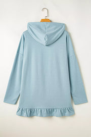 Solid Ruffled Hem Loose Fit Tunic Hoodie in Light Blue, back view