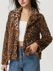 Leopard print faux fur blazer with buttoned front and lapel collar.