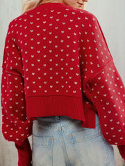 Dotted knit cropped crewneck sweater in Deep Red with white all-over pattern.