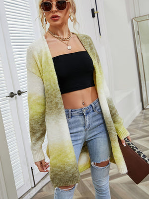 Rainbow gradient knit cardigan with open front and long sleeves, in yellow-green and white ombre.