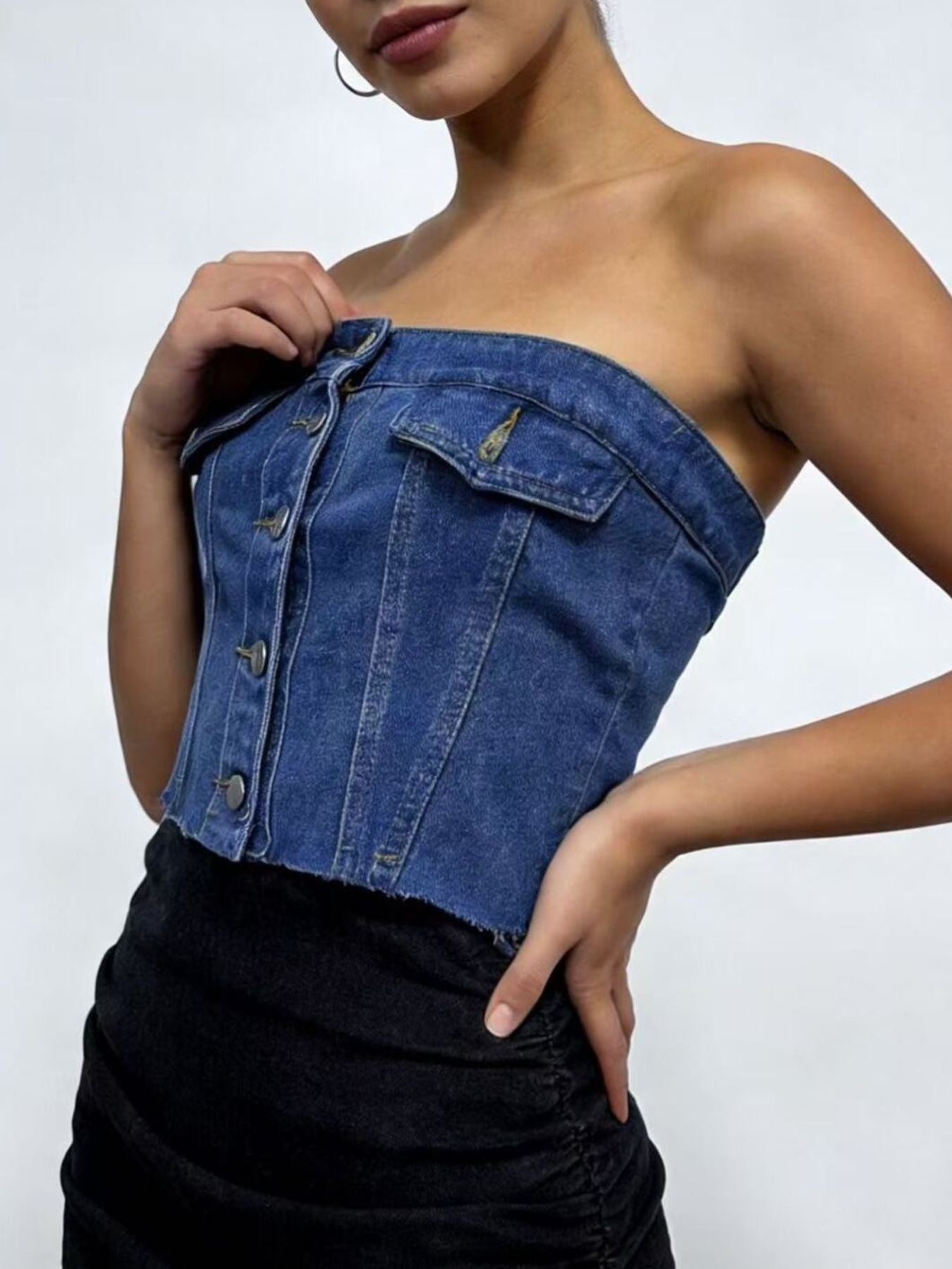 Blue denim strapless top with button front and flap pockets