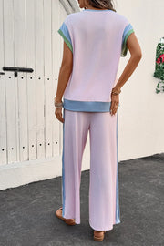 Ribbed blush pink lounge set with colorblock details and wide leg pants.