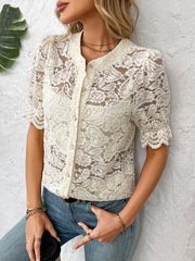Cream floral lace blouse with mandarin collar, short puff sleeves, and button front.