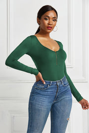 Dark green long sleeve bodysuit with plunge neckline and zip front detail.