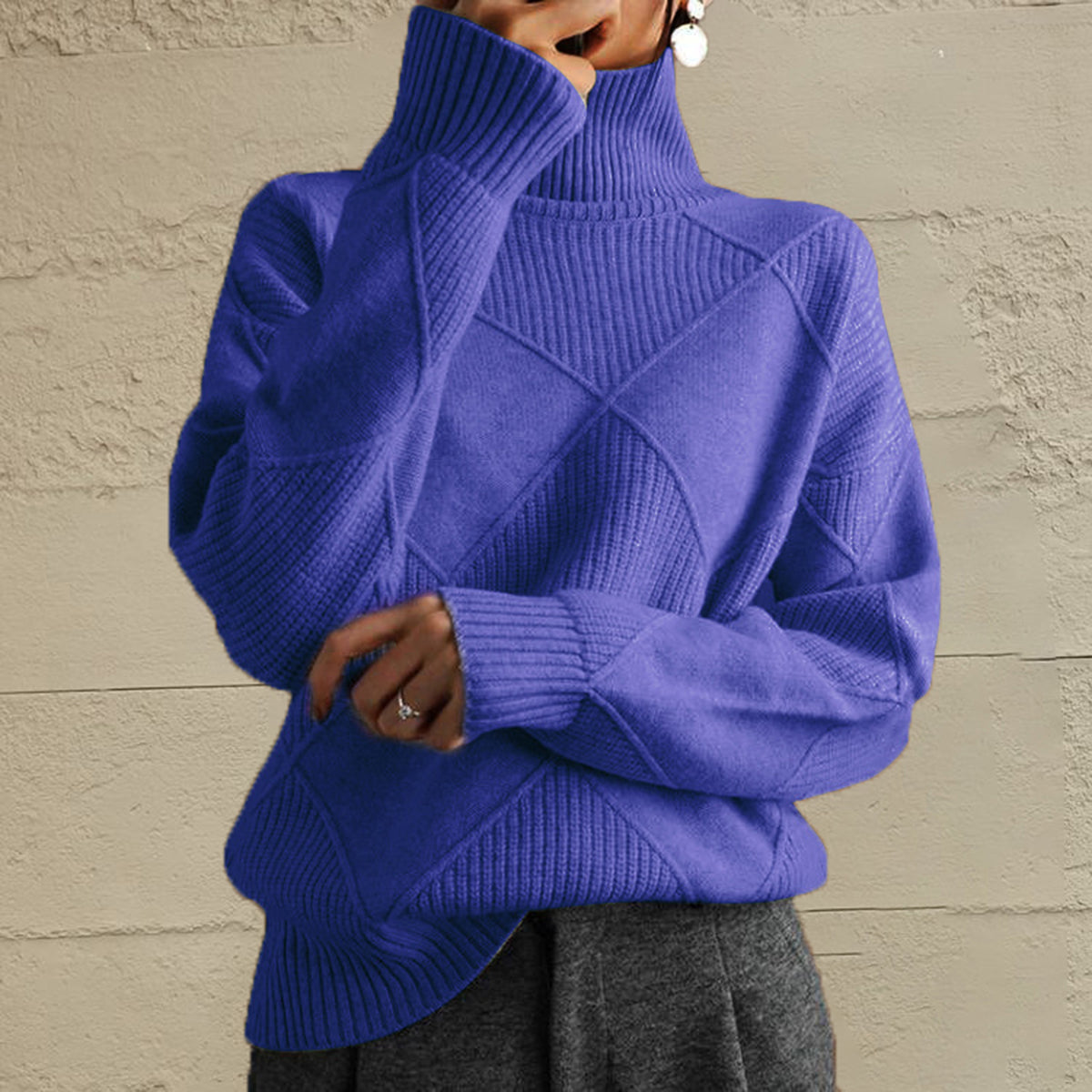Deep Purple turtleneck sweater with diamond knit pattern and ribbed cuffs.