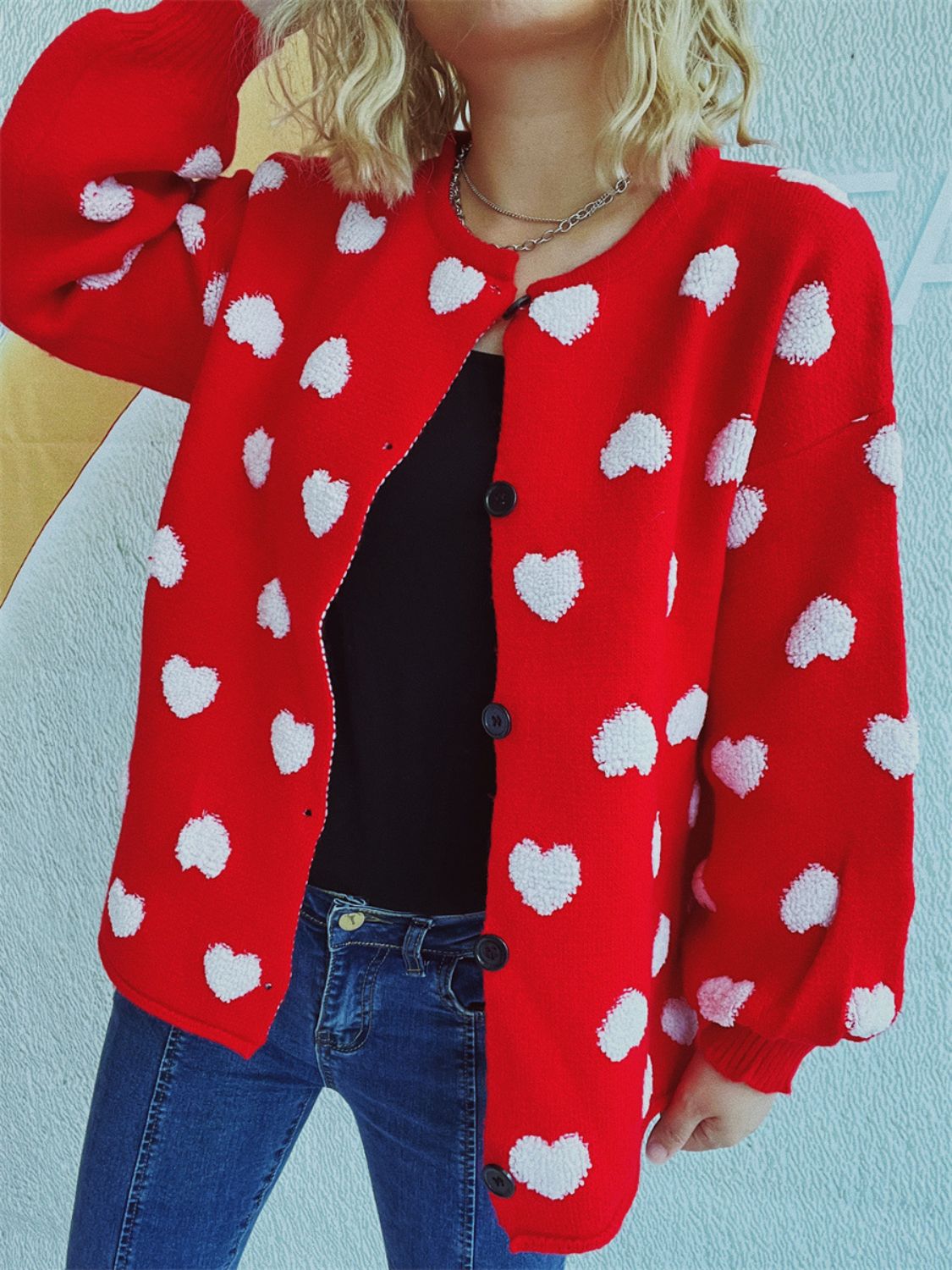 Deep Red acrylic button-down cardigan with white textured heart motif, crew neck, and long sleeves.